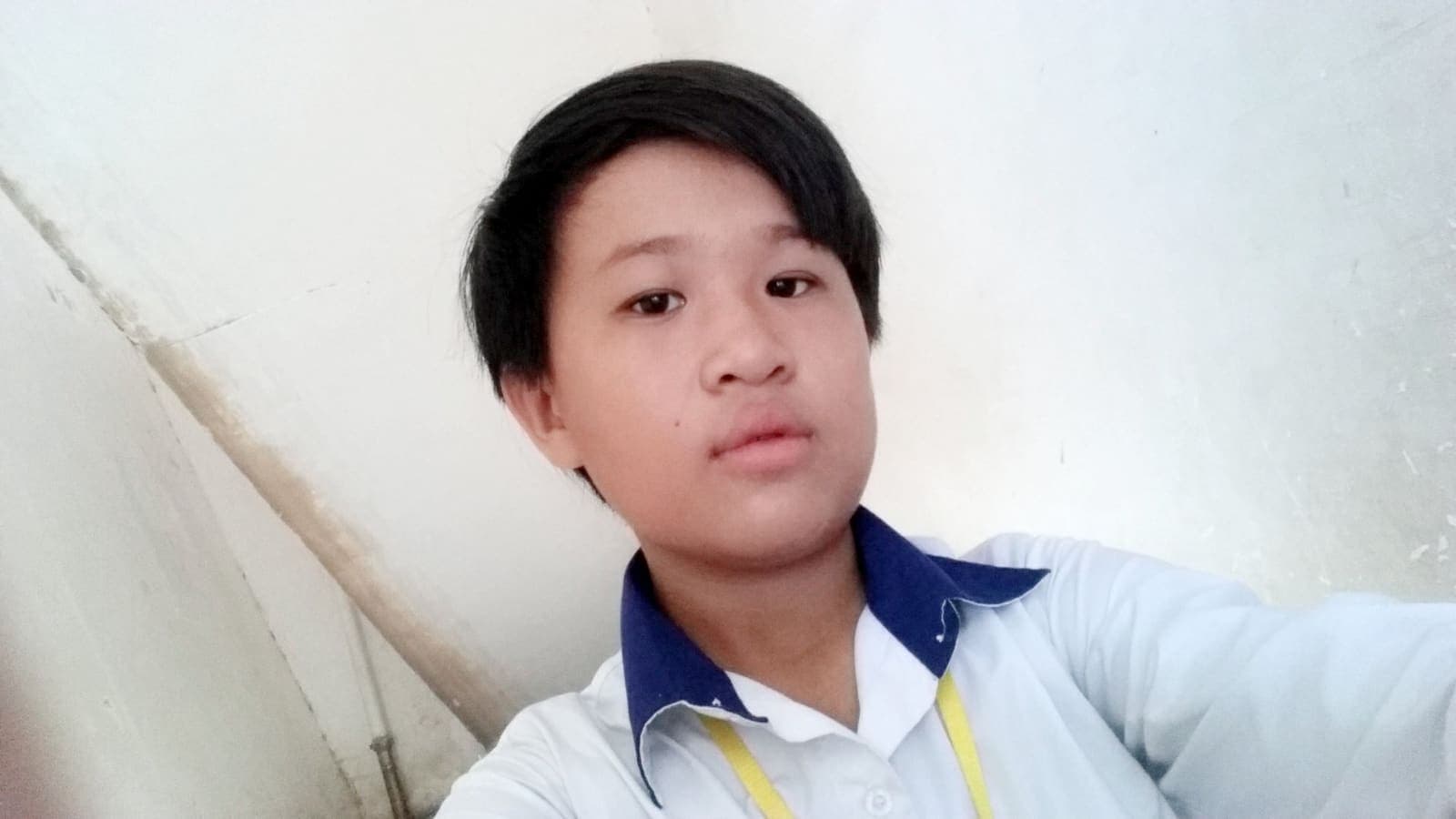 Nuon Hokseng in primary school uniform